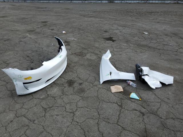 Photo 12 from auction – 2022 TESLA MODEL 3 with VIN 5YJ3E1EB8NF233891
