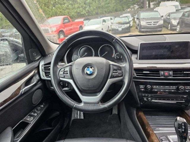 Photo 9 from auction – 2016 BMW X5 XDRIVE3 with VIN 5UXKS4C52G0N14569