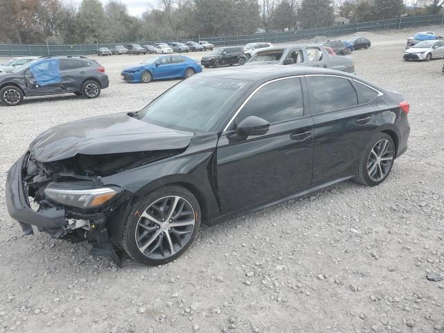 HONDA CIVIC TOUR 2023 with VIN 2HGFE1F94PH320694 - Photo from auction