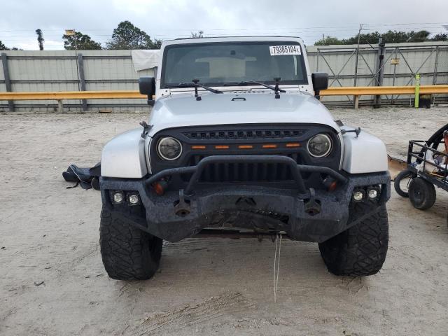 Photo 5 from auction – 2010 JEEP WRANGLER U with VIN 1J4BA5H19AL118588