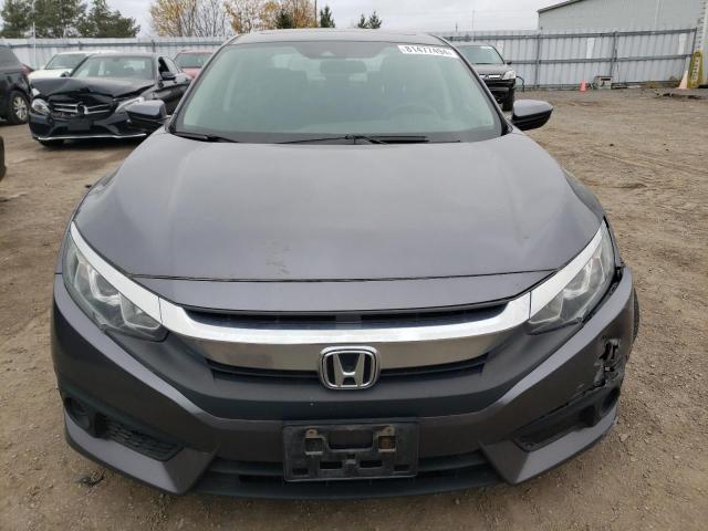 Photo 5 from auction – 2018 HONDA CIVIC EX with VIN 2HGFC2F86JH004210