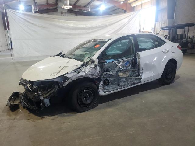TOYOTA COROLLA L 2015 with VIN 2T1BURHE7FC288194 - Photo from auction