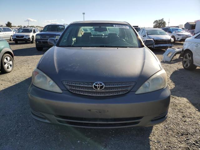 Photo 5 from auction – 2002 TOYOTA CAMRY LE with VIN JTDBF30K520003957