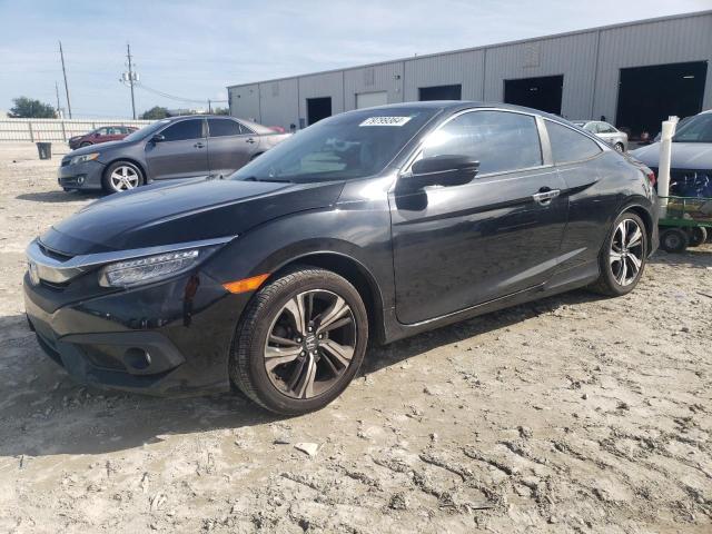 HONDA CIVIC TOUR 2016 with VIN 2HGFC3B94GH351371 - Photo from auction