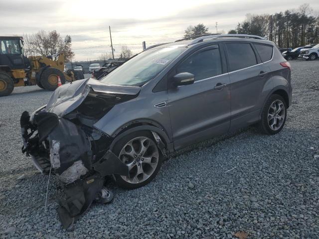 FORD ESCAPE TIT 2014 with VIN 1FMCU0J9XEUE06314 - Photo from auction