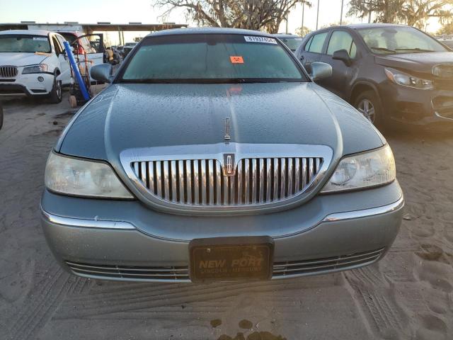 Photo 5 from auction – 2004 LINCOLN TOWN CAR E with VIN 1LNHM81WX4Y674295