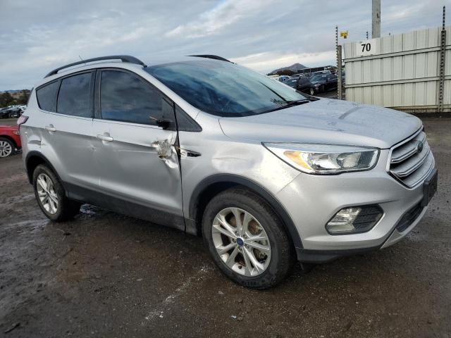 Photo 4 from auction – 2018 FORD ESCAPE SE with VIN 1FMCU9GD1JUA11366