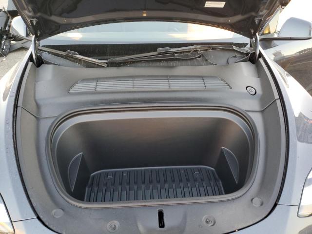 Photo 11 from auction – 2023 TESLA MODEL Y with VIN 7SAYGAEE6PF598358