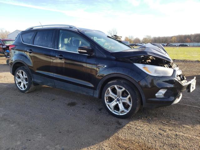 Photo 4 from auction – 2019 FORD ESCAPE TIT with VIN 1FMCU9J96KUB42170