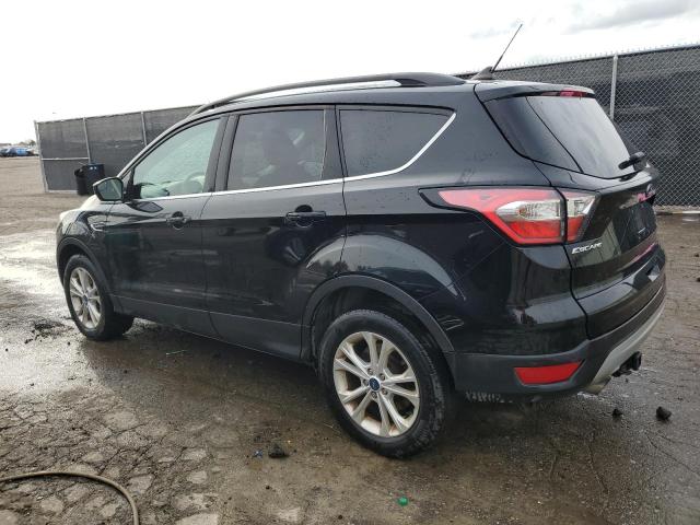 Photo 2 from auction – 2018 FORD ESCAPE SEL with VIN 1FMCU9HD6JUD56858