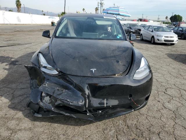 Photo 5 from auction – 2023 TESLA MODEL Y with VIN 7SAYGDEE6PA034305