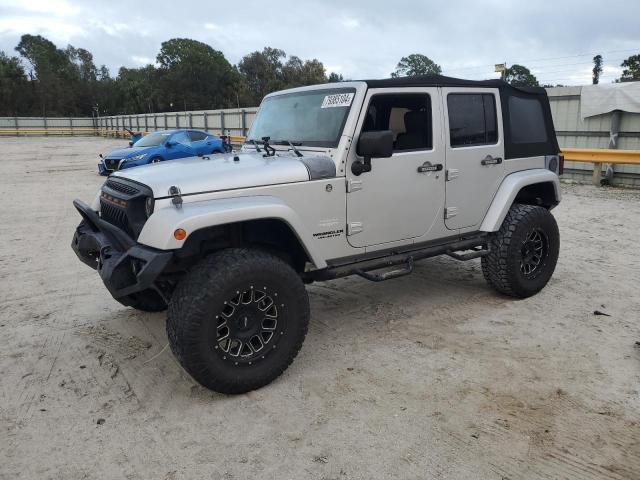 JEEP WRANGLER U 2010 with VIN 1J4BA5H19AL118588 - Photo from auction