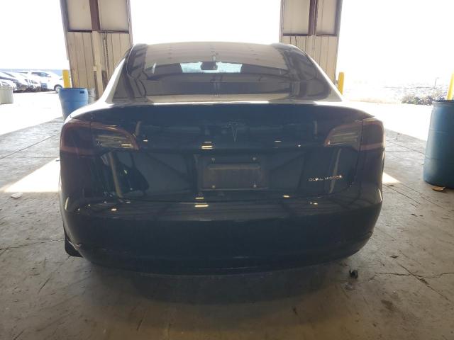 Photo 6 from auction – 2021 TESLA MODEL 3 with VIN 5YJ3E1EB3MF034049