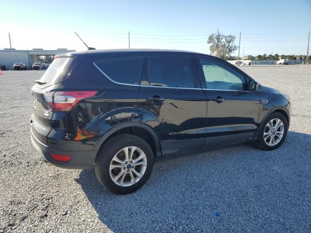 Photo 3 from auction – 2017 FORD ESCAPE SE with VIN 1FMCU0GD1HUE84853
