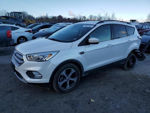 FORD ESCAPE SEL 2018 with VIN 1FMCU9HD0JUB98517 - Photo from auction
