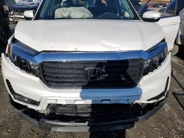 Photo 11 from auction – 2023 HONDA RIDGELINE with VIN 5FPYK3F56PB055086