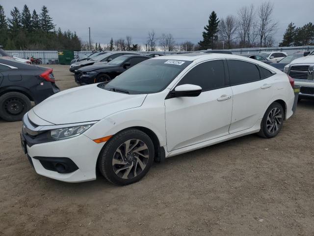 HONDA CIVIC EX 2018 with VIN 2HGFC2F82JH028830 - Photo from auction