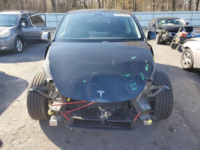 Photo 5 from auction – 2023 TESLA MODEL Y with VIN 7SAYGDEE8PA108582
