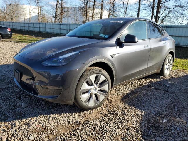 TESLA MODEL Y 2024 with VIN 7SAYGDEE4RA230679 - Photo from auction