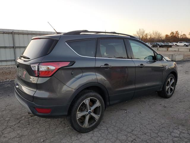 Photo 3 from auction – 2017 FORD ESCAPE SE with VIN 1FMCU9GD0HUC86009