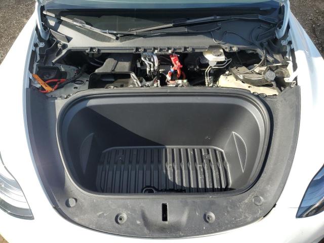 Photo 11 from auction – 2023 TESLA MODEL Y with VIN 7SAYGDEE8PF749346