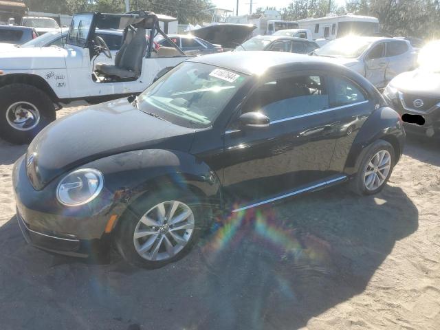 VOLKSWAGEN BEETLE 2014 with VIN 3VWJL7AT7EM667405 - Photo from auction