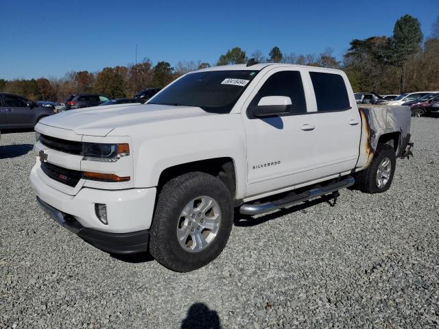 CHEVROLET SILVERADO 2018 with VIN 3GCUKRECXJG156126 - Photo from auction