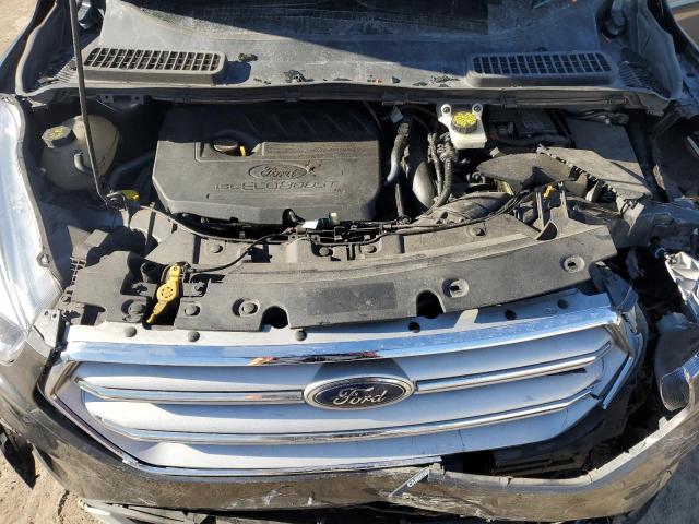 Photo 12 from auction – 2018 FORD ESCAPE SE with VIN 1FMCU9GD7JUD28018