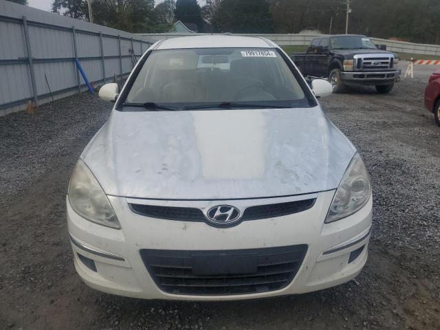 Photo 5 from auction – 2011 HYUNDAI ELANTRA TO with VIN KMHDB8AEXBU092309