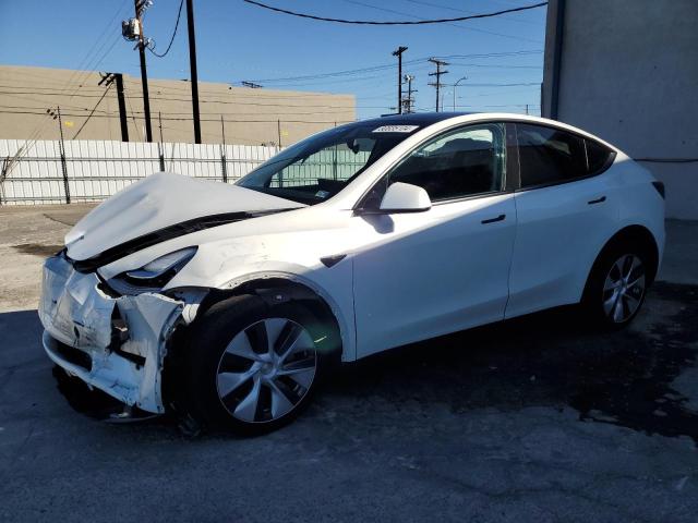 TESLA MODEL Y 2022 with VIN 7SAYGDEE0NA017688 - Photo from auction