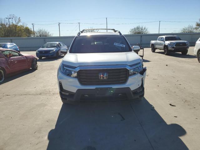 Photo 5 from auction – 2023 HONDA RIDGELINE with VIN 5FPYK3F71PB031909