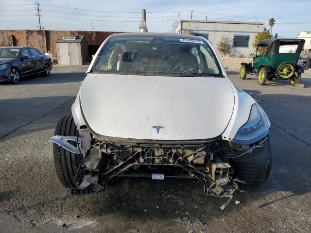 Photo 5 from auction – 2022 TESLA MODEL Y with VIN 7SAYGAEE7NF409018
