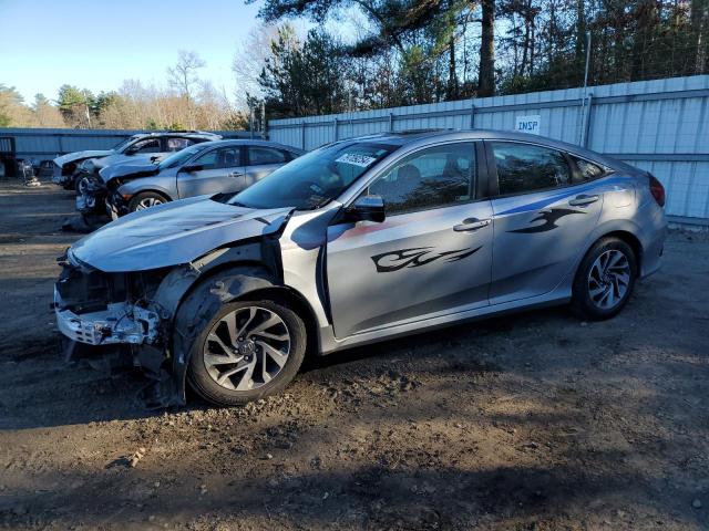 Photo 1 from auction – 2018 HONDA CIVIC EX with VIN 2HGFC2F77JH597180