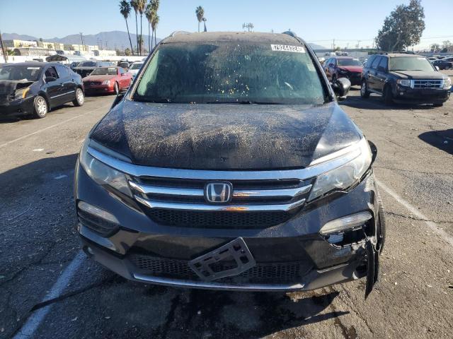 Photo 5 from auction – 2016 HONDA PILOT ELIT with VIN 5FNYF6H09GB105124