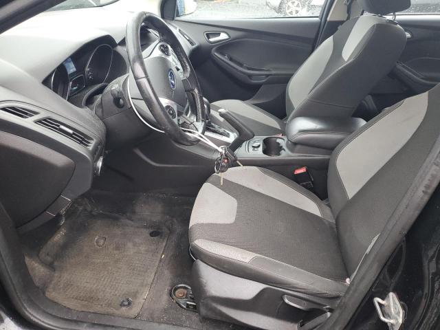 Photo 7 from auction – 2014 FORD FOCUS SE with VIN 1FADP3F24EL290164