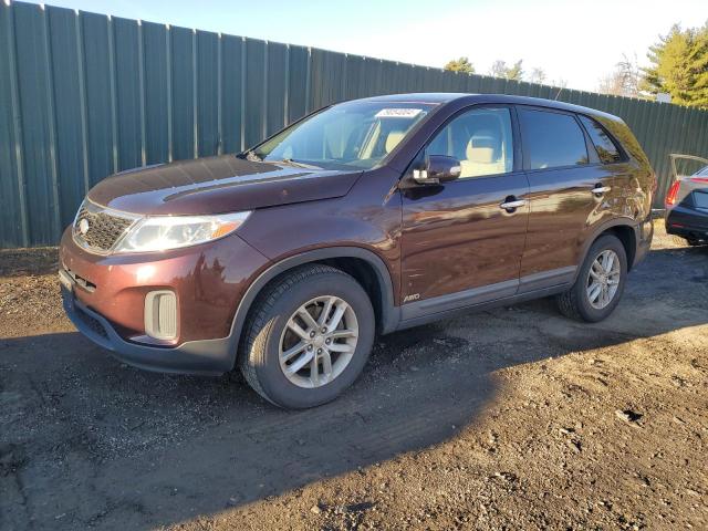 KIA SORENTO LX 2015 with VIN 5XYKTCA64FG552169 - Photo from auction