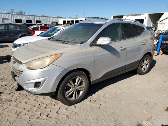 HYUNDAI TUCSON GLS 2012 with VIN KM8JUCAC1CU422595 - Photo from auction