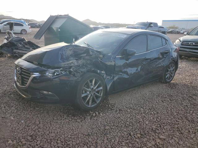 MAZDA 3 TOURING 2018 with VIN 3MZBN1L37JM162855 - Photo from auction