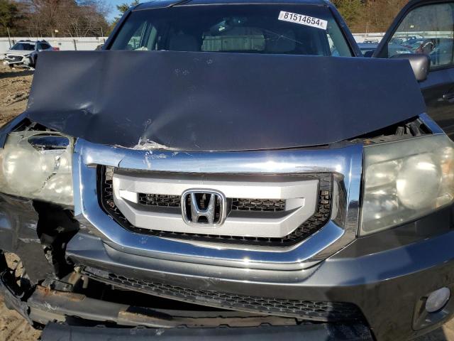 Photo 12 from auction – 2011 HONDA PILOT EX with VIN 5FNYF4H4XBB037612