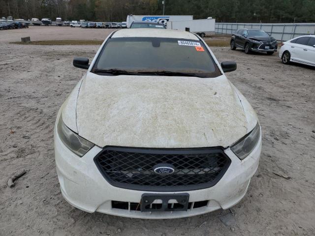 Photo 5 from auction – 2014 FORD TAURUS POL with VIN 1FAHP2L83EG161653