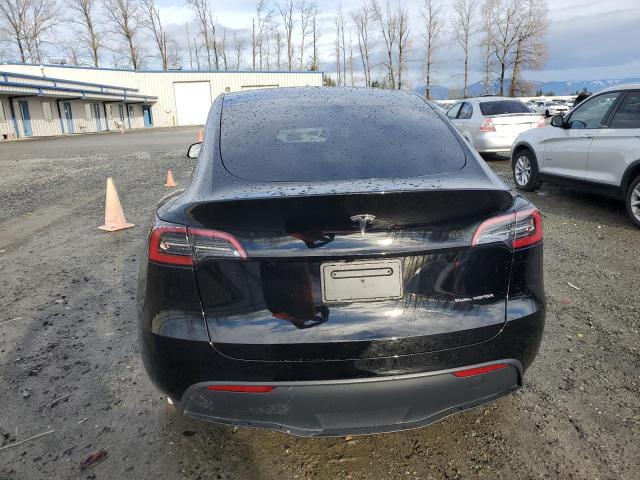 Photo 6 from auction – 2023 TESLA MODEL Y with VIN 7SAYGDEE3PF912209