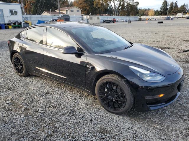 Photo 4 from auction – 2021 TESLA MODEL 3 with VIN 5YJ3E1EA6MF929509