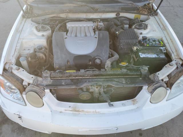 Photo 11 from auction – 2003 KIA OPTIMA with VIN KNAGD128335246024