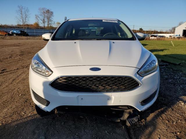 Photo 5 from auction – 2015 FORD FOCUS SE with VIN 1FADP3K23FL242047
