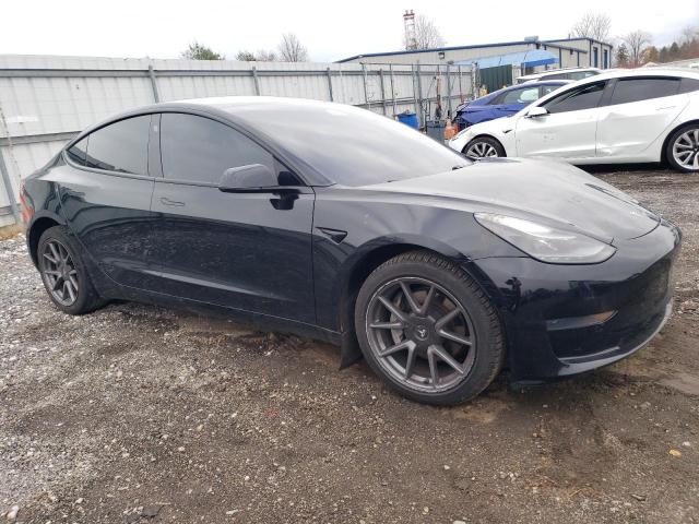 Photo 4 from auction – 2021 TESLA MODEL 3 with VIN 5YJ3E1EAXMF016073