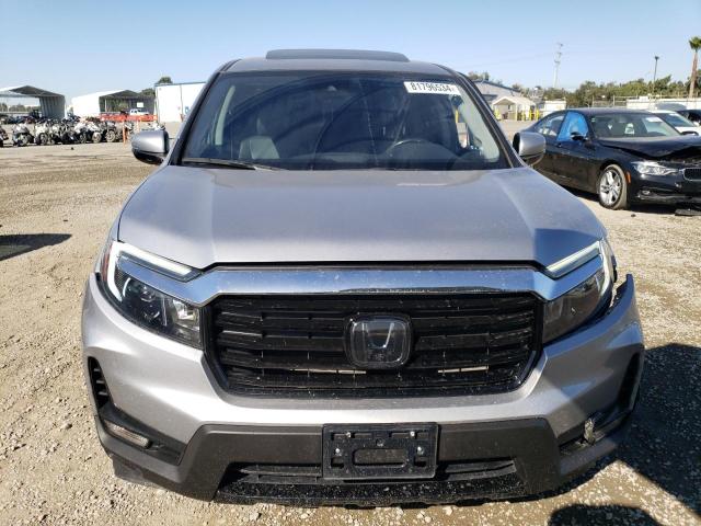 Photo 5 from auction – 2022 HONDA RIDGELINE with VIN 5FPYK3F75NB023745