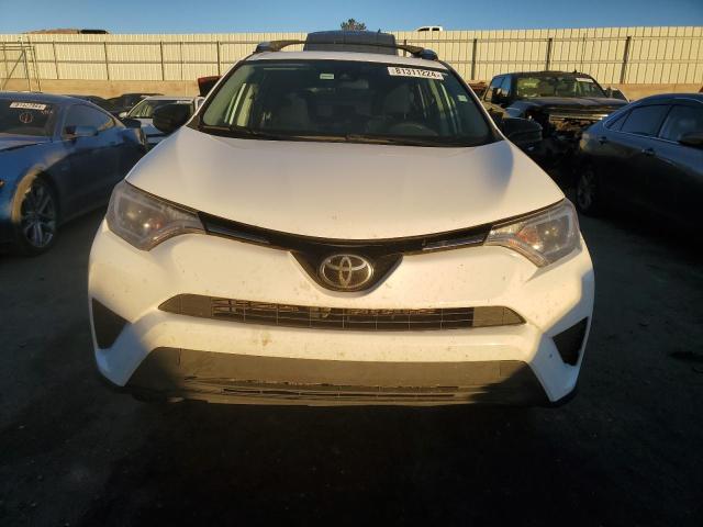 Photo 5 from auction – 2018 TOYOTA RAV4 LE with VIN 2T3BFREV5JW744755