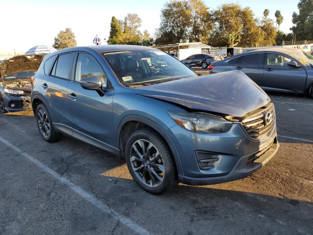Photo 4 from auction – 2016 MAZDA CX-5 GT with VIN JM3KE2DY0G0791539