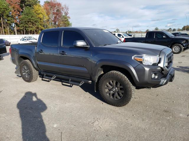 Photo 4 from auction – 2023 TOYOTA TACOMA with VIN 3TMAZ5CN9PM201840