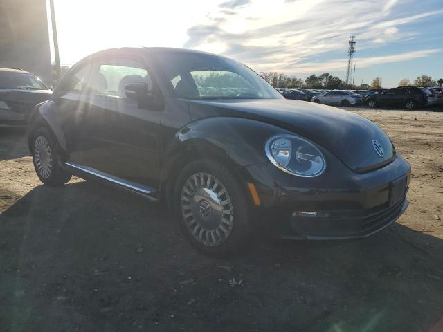 Photo 4 from auction – 2014 VOLKSWAGEN BEETLE with VIN 3VWJ17AT3EM646122